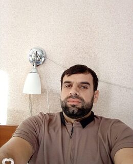 Манучер Олимов